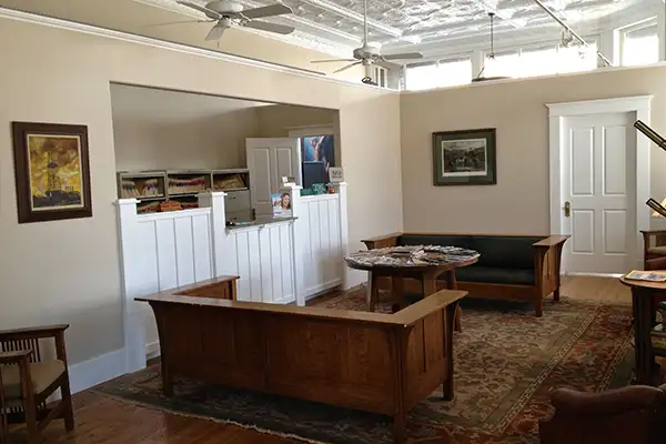 Office waiting area with sofas at Rolling Plains Dentistry in Quanah, TX 